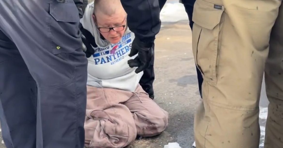Federal Agents Tackle Bald Female Protestor After She Throws Water Bottle at ICE Agents Outside Federal Building in Minneapolis (VIDEO)