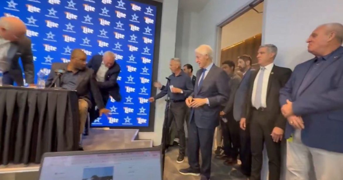 Jerry Jones Nearly Falls off the Stage as Bill Clinton Crashes Draft Press Conference (VIDEO)